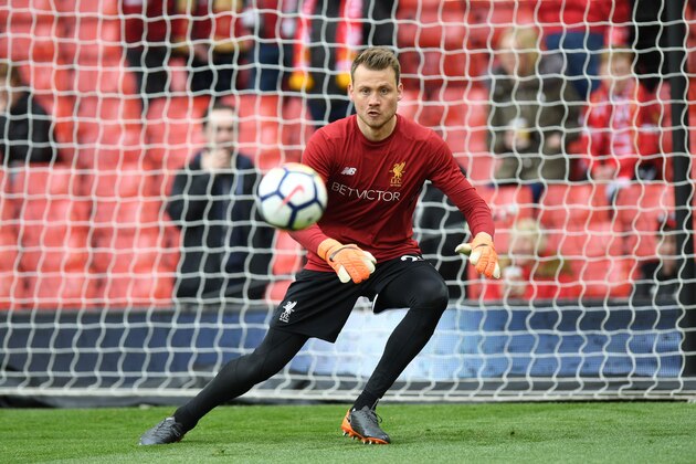 Liverpool's Belgian goalkeeper Simon Mignolet warms up before the English Premier League football match between Liverpool and Stoke City at Anfield in Liverpool, north west England on April 28, 2018. (Photo by Paul ELLIS / AFP) / RESTRICTED TO EDITORIAL USE. No use with unauthorized audio, video, data, fixture lists, club/league logos or 'live' services. Online in-match use limited to 75 images, no video emulation. No use in betting, games or single club/league/player publications. /         (Photo credit should read PAUL ELLIS/AFP/Getty Images)