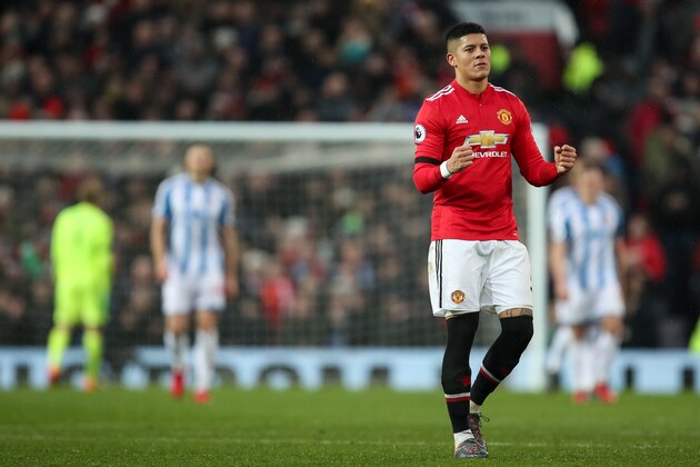 MANCHESTER, ENGLAND - FEBRUARY 03: Marcos Rojo of Manchester United celebrates during the Premier League match between Manchester United and Huddersfield Town at Old Trafford on February 3, 2018 in Manchester, England. (Photo by Robbie Jay Barratt - AMA/Getty Images)
