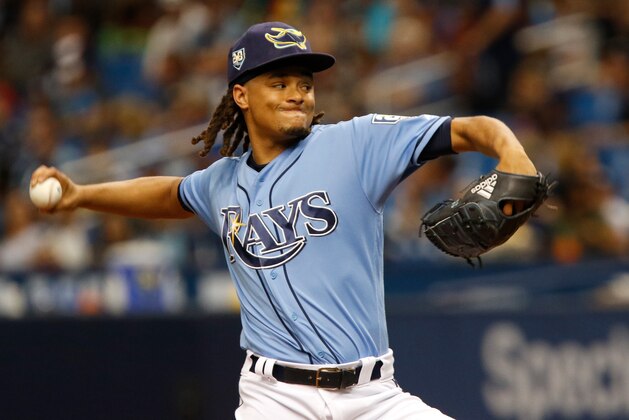 ST. PETERSBURG, FL  JULY 22: Chris Archer #22 of the Tampa Bay Rays delivers a pitch during the first inning against the Miami Marlins at Tropicana Field on July 22, 2017 in St. Petersburg, Florida. (Photo by Joseph Garnett Jr./Getty Images)