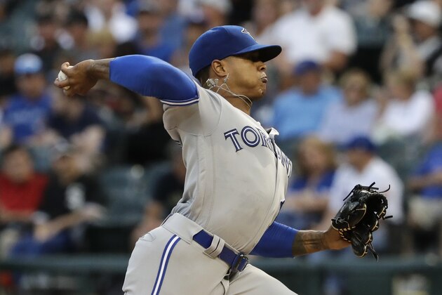 Toronto Blue Jays starting pitcher Marcus Stroman throws to a Chicago White Sox batter during the first inning of a baseball game Friday, July 27, 2018, in Chicago. (AP Photo/Nam Y. Huh)