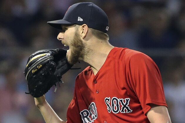 Boston Red Sox starting pitcher Chris Sale reacts on the mound during a baseball game against the Minnesota Twins at Fenway Park, Friday, July 27, 2018, in Boston. (AP Photo/Elise Amendola)
