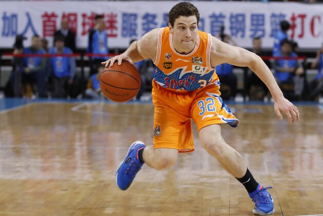 BEIJING,  CHINA - MARCH 04:  Jimmer Fredette #32 of Shanghai Bilibili in action during the 2017/2018 CBA League match between Beijing Ducks and Shanghai Bilibili at Cadillac Arena on March 4,  2018 in Beijing,  China.  (Photo by XIN LI/Getty Images)