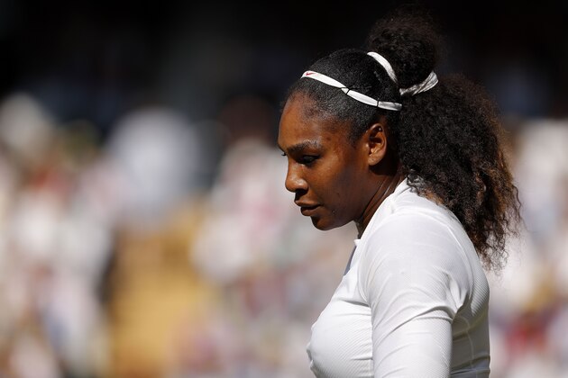 US player Serena Williams reacts against Germany's Angelique Kerber during their women's singles final match on the twelfth day of the 2018 Wimbledon Championships at The All England Lawn Tennis Club in Wimbledon, southwest London, on July 14, 2018. - Kerber won the match 6-3, 6-3. (Photo by ANDREW COULDRIDGE / POOL / AFP) / RESTRICTED TO EDITORIAL USE        (Photo credit should read ANDREW COULDRIDGE/AFP/Getty Images)