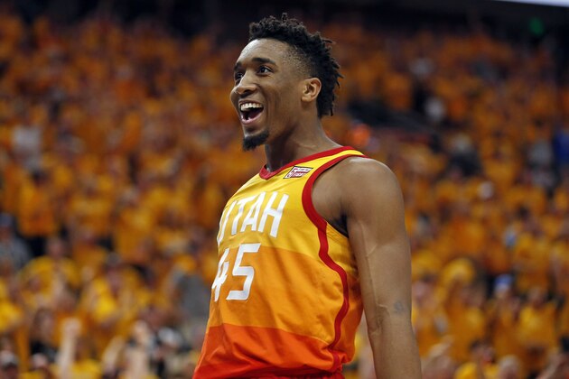 Utah Jazz guard Donovan Mitchell celebrates after scoring against the Oklahoma City Thunder during the second half of Game 3 of an NBA basketball first-round playoff series Saturday, April 21, 2018, in Salt Lake City. The Jazz won 115-102. (AP Photo/Rick Bowmer)