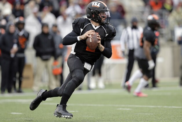 Former Heisman Trophy-winning quarterback Johnny Manziel (2) scrambles as he looks to throw during a developmental Spring League football game, Saturday, April 7, 2018, in Austin, Texas. Manziel is hoping to impress NFL scouts in his bid to return to the league. (AP Photo/Eric Gay)