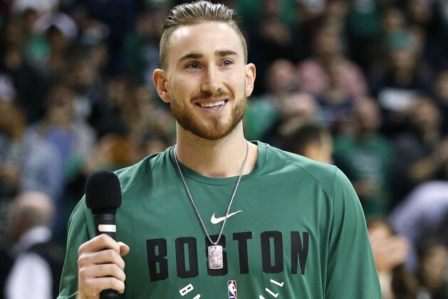 Boston Celtics Gordon Hayward addresses the crowd before an NBA basketball game against the Washington Wizards in Boston, Monday, Dec. 25, 2017. (AP Photo/Michael Dwyer)