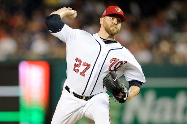 WASHINGTON, DC - JULY 02:  Shawn Kelley #27 of the Washington Nationals pitches against the Boston Red Sox at Nationals Park on July 2, 2018 in Washington, DC.  (Photo by G Fiume/Getty Images)