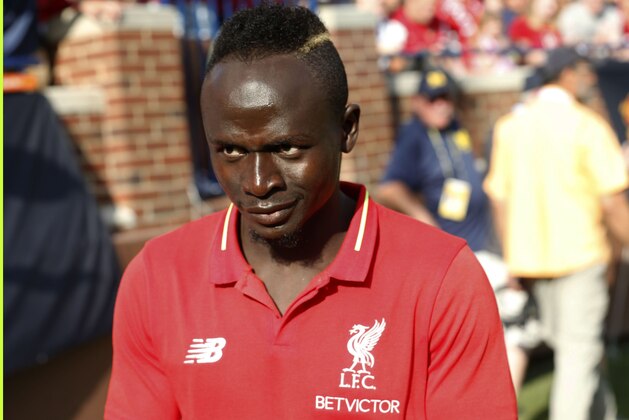 Liverpool FC Sadio Mane returns from the locker room as they play Manchester United during the 2018 International Champions Cup football match at Michigan Stadium in Ann Arbor, Michigan on July 28, 2018. - Liverpool FC beat Manchester United 4-1 in their friendly. (Photo by JEFF KOWALSKY / AFP)        (Photo credit should read JEFF KOWALSKY/AFP/Getty Images)