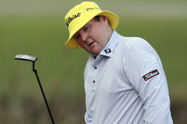 FILE - In this April 23, 2015 file photo, Jarrod Lyle, of Australia, reacts after missing a putt on the 17th hole during the first round of the Zurich Classic PGA golf tournament in Avondale, La. Jarrod Lyle has opted not to seek further treatment in his long fight against leukemia and will receive palliative care at home, his family has announced. (AP Photo/Butch Dill, File)
