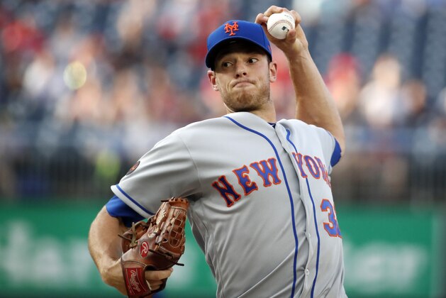 New York Mets starting pitcher Steven Matz throws during the first inning of the team's baseball game against the Washington Nationals at Nationals Park, Tuesday, July 31, 2018, in Washington. (AP Photo/Alex Brandon)