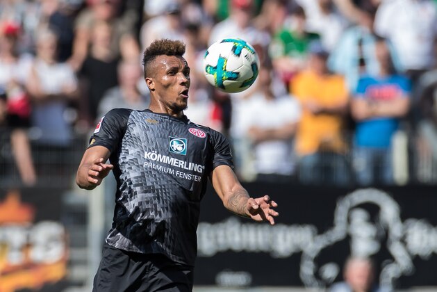 AUGSBURG, GERMANY - APRIL 22: Jean-Philippe Gbamin of Mainz controls the ball during the Bundesliga match between FC Augsburg and 1. FSV Mainz 05 at WWK-Arena on April 22, 2018 in Augsburg, Germany. (Photo by TF-Images/TF-Images via Getty Images)
