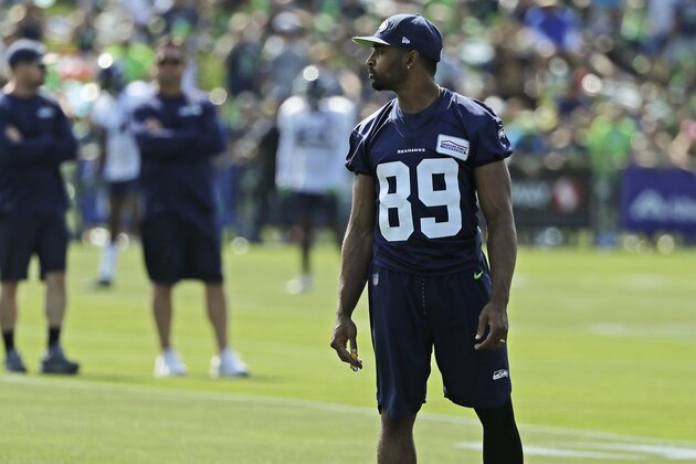 Seattle Seahawks wide receiver Doug Baldwin stands on the field during NFL football training camp, Sunday, July 29, 2018, in Renton, Wash. (AP Photo/Ted S. Warren)