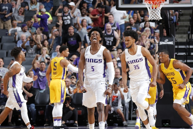 SALT LAKE CITY - JULY 2:  De'Aaron Fox #5 of the Sacramento Kings reacts during the 2018 Summer League at the Golden 1 Center on July 2, 2018 in Sacramento, California. NOTE TO USER: User expressly acknowledges and agrees that, by downloading and or using this photograph, User is consenting to the terms and conditions of the Getty Images License Agreement. Mandatory Copyright Notice: Copyright 2018 NBAE (Photo by Rocky Widner/NBAE via Getty Images)