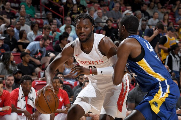 LAS VEAGS, NV - JULY 8: Chinanu Onuaku #21 of the Houston Rockets handles the ball against the Golden States Warriors during the 2018 Las Vegas Summer League on July 8, 2018 at the Thomas & Mack Center in Las Vegas, Nevada. NOTE TO USER: User expressly acknowledges and agrees that, by downloading and/or using this Photograph, user is consenting to the terms and conditions of the Getty Images License Agreement. Mandatory Copyright Notice: Copyright 2018 NBAE (Photo by Garrett Ellwood/NBAE via Getty Images)