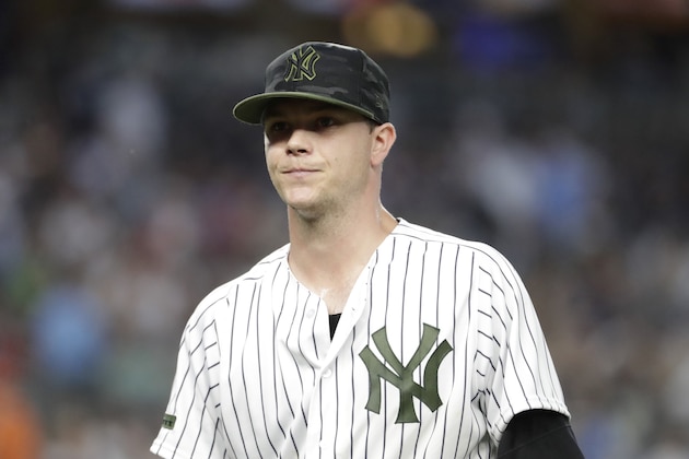 New York Yankees starting pitcher Sonny Gray walks off the field after the top of the third inning of a baseball game against the Los Angeles Angels, Saturday, May 26, 2018, in New York. (AP Photo/Julio Cortez) New York Yankees starting pitcher Sonny Gray walks off the field after the top of the third inning of a baseball game against the Los Angeles Angels, Saturday, May 26, 2018, in New York. (AP Photo/Julio Cortez)