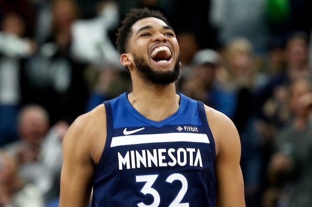 Minnesota Timberwolves' Karl-anthony Towns plays against the Houston Rockets in the first half during Game 3 of an NBA basketball first round playoff series Saturday, April 21, 2018, in Minneapolis. (AP Photo/Jim Mone)