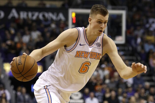 New York Knicks forward Kristaps Porzingis (6) in the first half during an NBA basketball game against the Phoenix Suns, Friday, Jan. 26, 2018, in Phoenix. (AP Photo/Rick Scuteri) New York Knicks forward Kristaps Porzingis (6) in the first half during an NBA basketball game against the Phoenix Suns, Friday, Jan. 26, 2018, in Phoenix. (AP Photo/Rick Scuteri)