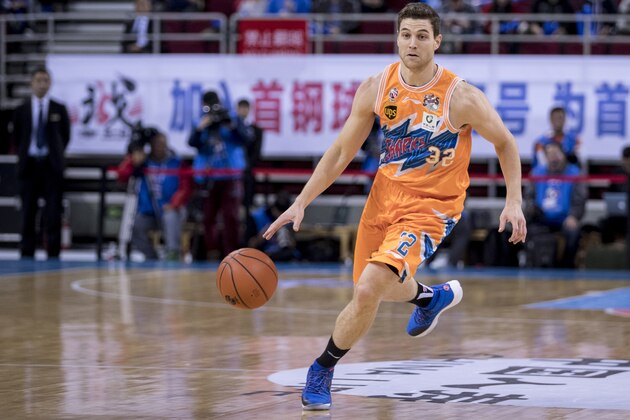 BEIJING, CHINA - NOVEMBER 15:  Jimmer Fredette #32 of Shanghai Sharks in action during the 2017/2018 CBA League match between Beijing Ducks and Shanghai Sharks at Cadillac Arena on November 15, 2017 in Beijing, China.  (Photo by XIN LI/Getty Images)