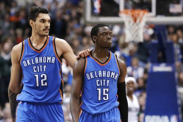Oklahoma City Thunder guard Reggie Jackson (15) and center Steven Adams (12) look at referees as they head to the bench for a timeout after a call went against the Thunder during the second half of an NBA basketball game against the Dallas Mavericks on Sunday, Dec. 28, 2014, in Dallas. The Mavericks won 112-107. (AP Photo/LM Otero)