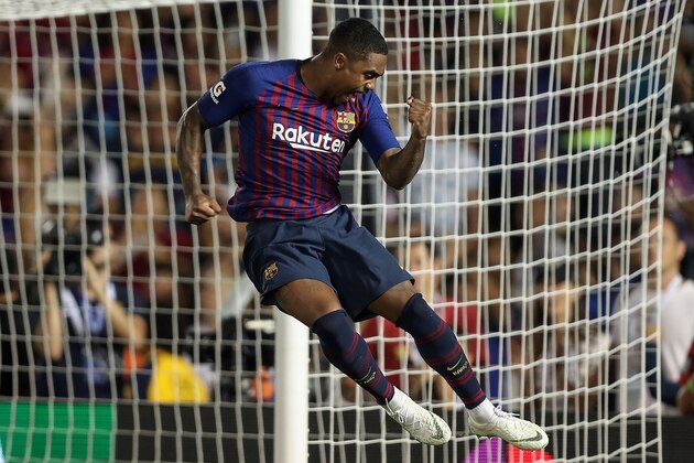 PASADENA, CA - JULY 28:  Malcom #26 of FC Barcelona celebrates after scoring the match winning penalty over Tottenham Hotspur during an International Champions Cup match at Rose Bowl on July 28, 2018 in Pasadena, California.  (Photo by Joe Scarnici/International Champions Cup/Getty Images)
