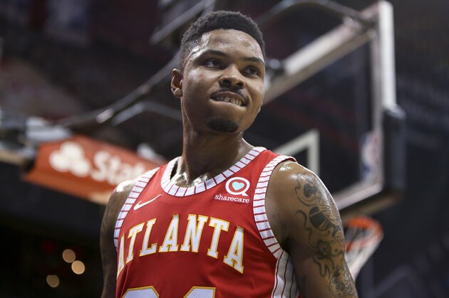 Atlanta Hawks guard Kent Bazemore reacts during the second half of the team's NBA basketball game against the Indiana Pacers, Wednesday, Feb. 28, 2018, in Atlanta. Atlanta won 107-102. (AP Photo/Brett Davis)