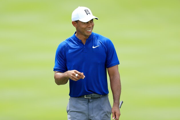 AKRON, OH - AUGUST 02:  Tiger Woods reacts after making birdie on the 18th green during World Golf Championships-Bridgestone Invitational - Round One at Firestone Country Club South Course on August 2, 2018 in Akron, Ohio.  (Photo by Sam Greenwood/Getty Images)