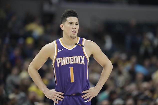 Phoenix Suns' Devin Booker in action during the first half of an NBA basketball game against the Indiana Pacers, Wednesday, Jan. 24, 2018, in Indianapolis. (AP Photo/Darron Cummings)