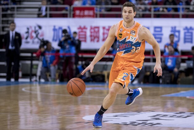 BEIJING, CHINA - NOVEMBER 15:  Jimmer Fredette #32 of Shanghai Sharks in action during the 2017/2018 CBA League match between Beijing Ducks and Shanghai Sharks at Cadillac Arena on November 15, 2017 in Beijing, China.  (Photo by XIN LI/Getty Images)