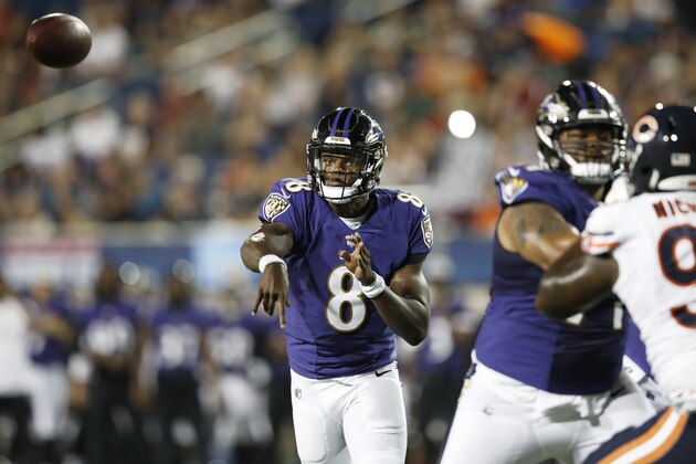 CANTON, OH - AUGUST 02: Lamar Jackson #8 of the Baltimore Ravens throws for a touchdown in the third quarter of the Hall of Fame Game against the Chicago Bears at Tom Benson Hall of Fame Stadium on August 2, 2018 in Canton, Ohio. (Photo by Joe Robbins/Getty Images)