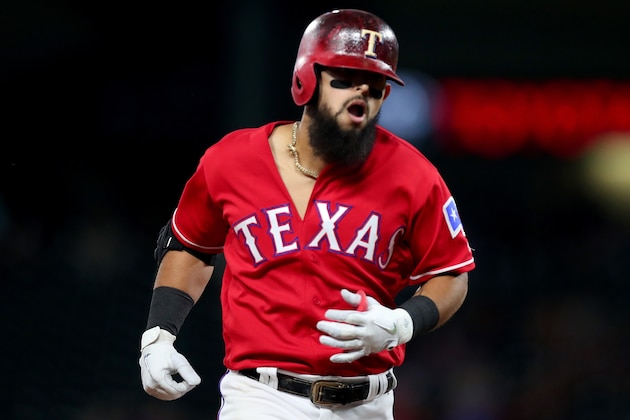 ARLINGTON, TX - AUGUST 02:  Rougned Odor #12 of the Texas Rangers rounds the bases after hitting a two-run home run against the Baltimore Orioles in the bottom of the sixth inning at Globe Life Park in Arlington on August 2, 2018 in Arlington, Texas.  (Photo by Tom Pennington/Getty Images)