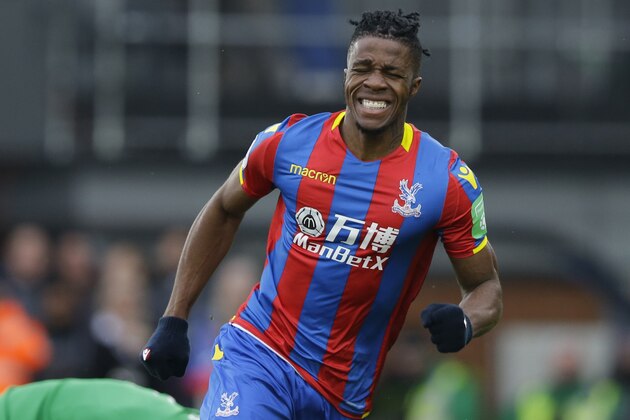 Crystal Palace's Wilfried Zaha reacts after missing a chance to score during the English Premier League soccer match between Crystal Palace and Liverpool at Selhurst Park stadium in London, Saturday, March, 31, 2018. (AP Photo/Alastair Grant)