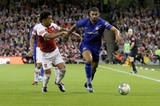 Arsenal's English midfielder Reiss Nelson (L) vies with Chelsea's English midfielder Ruben Loftus-Cheek during the International Champions Cup football match between Chelsea and Arsenal the the Aviva Stadium in Dublin on August 1, 2018. (Photo by Paul FAITH / AFP)        (Photo credit should read PAUL FAITH/AFP/Getty Images)