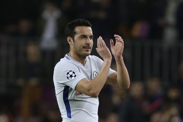 Chelsea's Pedro acknowledges cheering fans after his team's elimination during the Champions League round of sixteen second leg soccer match between FC Barcelona and Chelsea at the Camp Nou stadium in Barcelona, Spain, Wednesday, March 14, 2018. (AP Photo/Emilio Morenatti)