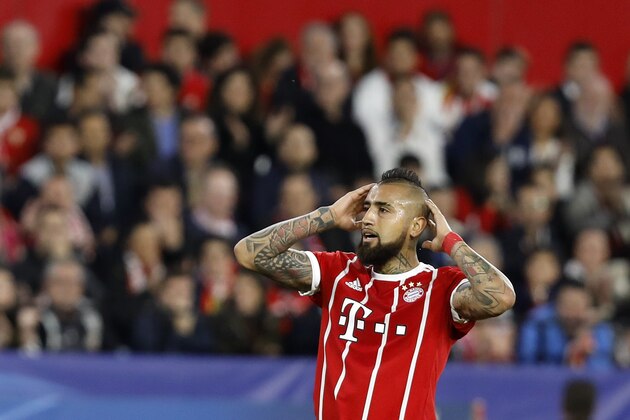 Bayern's Arturo Vidal reacts during the Champions League quarter final first leg soccer match between Sevilla FC and FC Bayern Munich at the Sanchez Pizjuan stadium in Seville, Spain, Tuesday, April 3, 2018. (AP Photo/Miguel Morenatti)