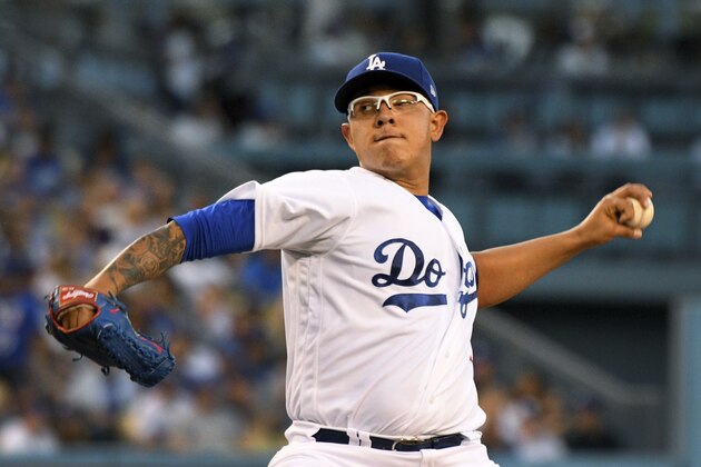Los Angeles Dodgers' Julio Urias pitches against the Miami Marlins in the first inning of a baseball game in Los Angeles, Saturday, May 20, 2017. (AP Photo/Michael Owen Baker)
