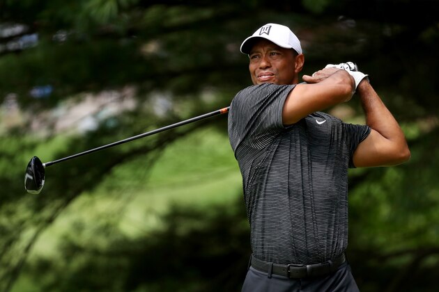 AKRON, OH - AUGUST 03:  Tiger Woods plays his shot from the second tee during World Golf Championships-Bridgestone Invitational - Round Two at Firestone at Firestone Country Club South Course on August 3, 2018 in Akron, Ohio.  (Photo by Gregory Shamus/Getty Images)
