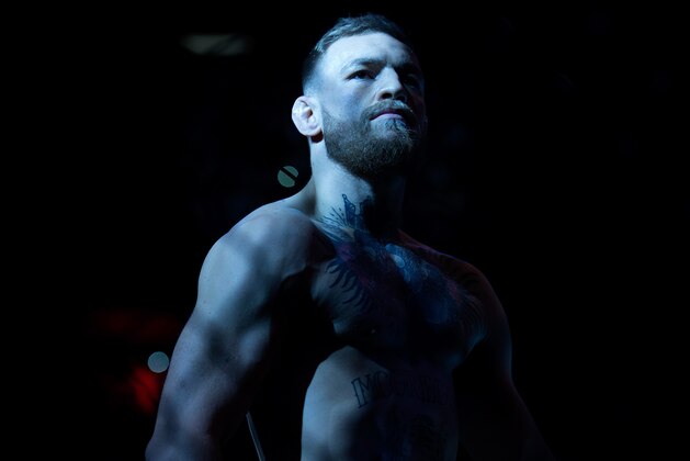 NEW YORK, NY - NOVEMBER 12:  Conor McGregor of Ireland enters the Octagon before facing Eddie Alvarez in their UFC lightweight championship fight during the UFC 205 event at Madison Square Garden on November 12, 2016 in New York City. (Photo by Brandon Magnus/Zuffa LLC/Zuffa LLC via Getty Images)