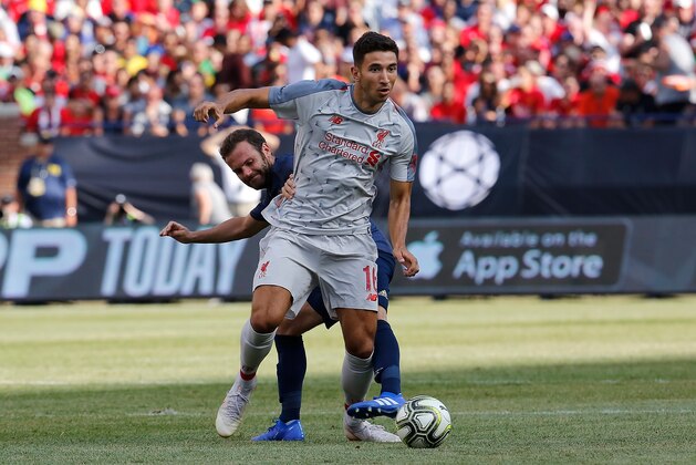 ANN ARBOR, MI - JULY 28:  Marko Grujic #16 of Liverpool advances the ball in front of Juan Mata #8 of Manchester United in the second half during the International Champions Cup 2018 match at Michigan Stadium on July 28, 2018 in Ann Arbor, Michigan. (Photo by Rey Del Rio/International Champions Cup/Getty Images)