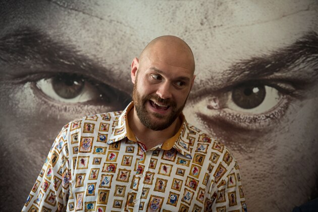 Former British heavyweight world boxing champion Tyson Fury attends a press conference to publicise his return to the ring at the Lowry Hotel in Manchester, north-west England on April 26, 2018. - Tyson Fury says he could beat reigning world heavyweight champion Deontay Wilder with 'a hand tied behind my back' as the British fighter nears his comeback after more than two years out of the ring. (Photo by OLI SCARFF / AFP)        (Photo credit should read OLI SCARFF/AFP/Getty Images)