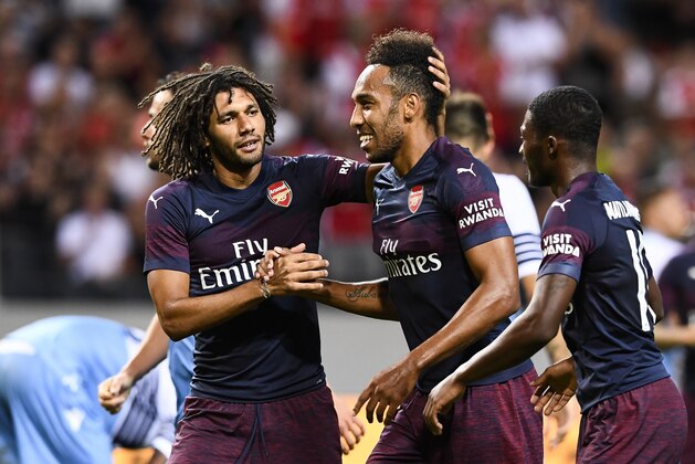 Arsenal's Gabonese striker Pierre-Emerick Aubameyang (C) celebrates with his teammates after scoring the 2-0 goal during a pre-season friendly football match between Arsenal FC and SS Lazio at the Friends Arena in Solna near Stockholm, Sweden on August 4, 2018. (Photo by Jonathan NACKSTRAND / AFP)        (Photo credit should read JONATHAN NACKSTRAND/AFP/Getty Images)