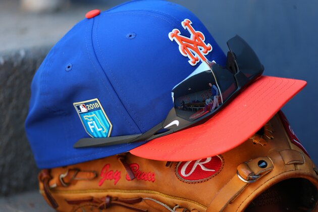 WEST PALM BEACH, FL - MARCH 08: The The New Era cap, Rawlings glove and Nike sunglasses of Jay Bruce #19 of the New York Mets in the dugout during a spring training game against the Washington Nationals  at FITTEAM Ball Park of the Palm Beaches on March 8, 2018 in West Palm Beach, Florida. (Photo by Rich Schultz/Getty Images)