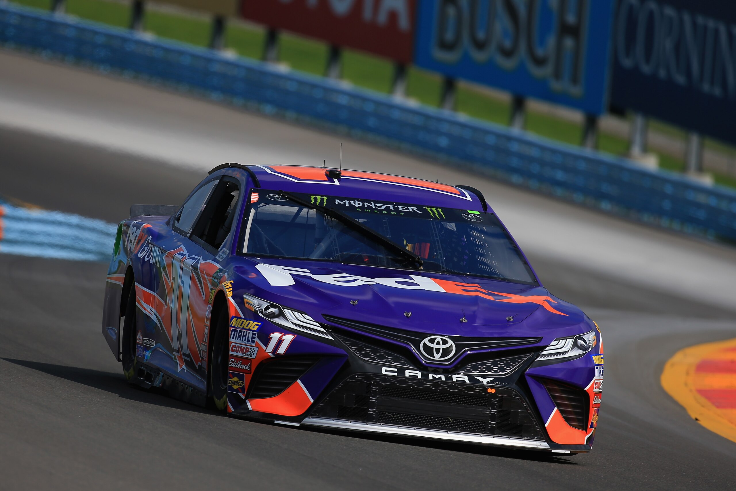 WATKINS GLEN, NY - AUGUST 04: Denny Hamlin, driver of the #11 FedEx Ground Toyota, practices for the Monster Energy NASCAR Cup Series GoBowling at The Glen at Watkins Glen International on August 4, 2018 in Watkins Glen, New York.  (Photo by Chris Trotman/Getty Images)