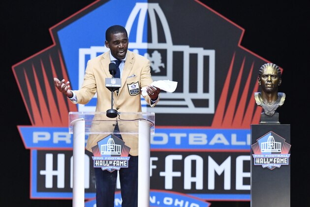 Former NFL wide receiver Randy Moss delivers his induction speech at the Pro Football Hall of Fame on Saturday, Aug. 4, 2018, in Canton, Ohio. (AP Photo/David Richard)