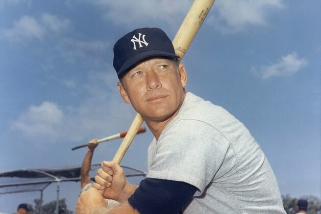 Shown in photo are head and shoulders of New York Yankee player, Mickey Mantle in action shown 1966. (AP Photo)