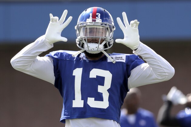 New York Giants wide receiver Odell Beckham gestures toward fans during NFL football training camp, Thursday, July 26, 2018, in East Rutherford, N.J. (AP Photo/Julio Cortez)