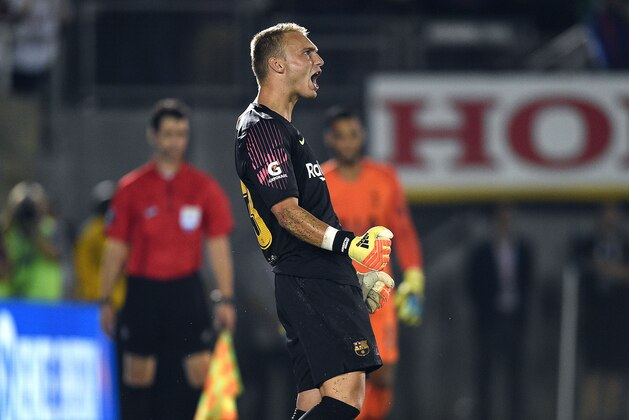 PASADENA, CA - JULY 28: Goalkeeper Jasper Cillessen #13 of FC Barcelona celebrates after a stoping a penalty kick by Anthony Georgiou #42 during the penalty shootout during an International Champions Cup 2018 match at Rose Bowl on July 28, 2018 in Pasadena, California. Barcelona defeated Tottenham on penalty kicks after the match ended 2-2 in regulation(Photo by Kevork Djansezian/Getty Images)