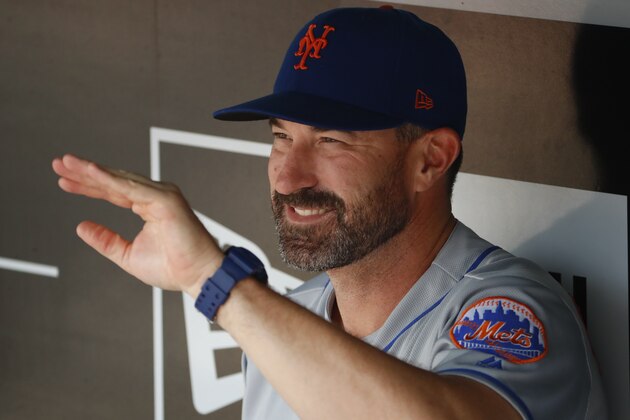 New York Mets manager Mickey Callaway sits in the dugout before the team's baseball game against the Pittsburgh Pirates in Pittsburgh, Sunday, July 29, 2018. The Mets won 1-0. (AP Photo/Gene J. Puskar)