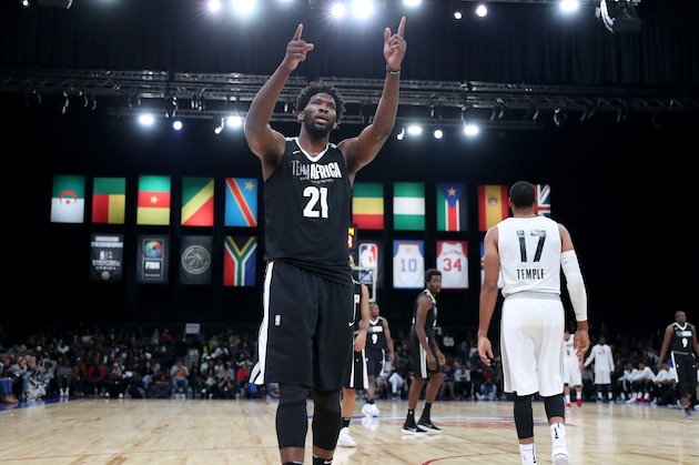 PRETORIA, SOUTH AFRICA - AUGUST 4: Joel Embiid #21 of Team Africa reacts during the game against Team World during the 2018 NBA Africa Game as part of the Basketball Without Borders Africa on August 4, 2018 at the Time Square Sun Arena in Pretoria, South Africa. NOTE TO USER: User expressly acknowledges and agrees that, by downloading and or using this photograph, User is consenting to the terms and conditions of the Getty Images License Agreement. Mandatory Copyright Notice: Copyright 2017 NBAE (Photo by Joe Murphy/NBAE via Getty Images)