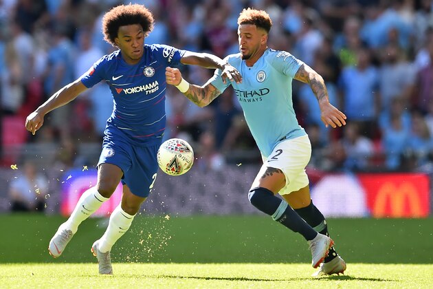 Chelsea's Brazilian midfielder Willian (L) vies with Manchester City's English defender Kyle Walker (R) during the English FA Community Shield football match between Chelsea and Manchester City at Wembley Stadium in north London on August 5, 2018. (Photo by Glyn KIRK / AFP) / NOT FOR MARKETING OR ADVERTISING USE / RESTRICTED TO EDITORIAL USE        (Photo credit should read GLYN KIRK/AFP/Getty Images)
