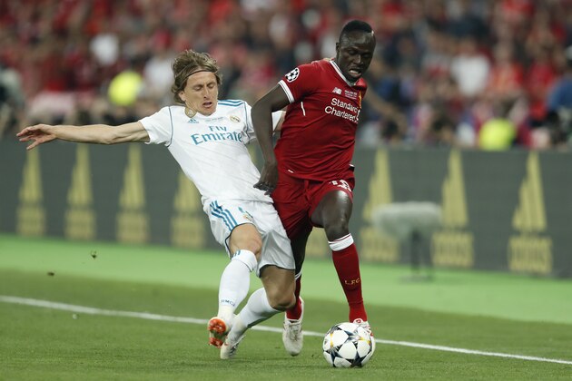 (L-R) Luka Modric of Real Madrid, Sadio Mane of Liverpool FC during the UEFA Champions League final between Real Madrid and Liverpool on May 26, 2018 at NSC Olimpiyskiy Stadium in Kyiv, Ukraine(Photo by VI Images via Getty Images)